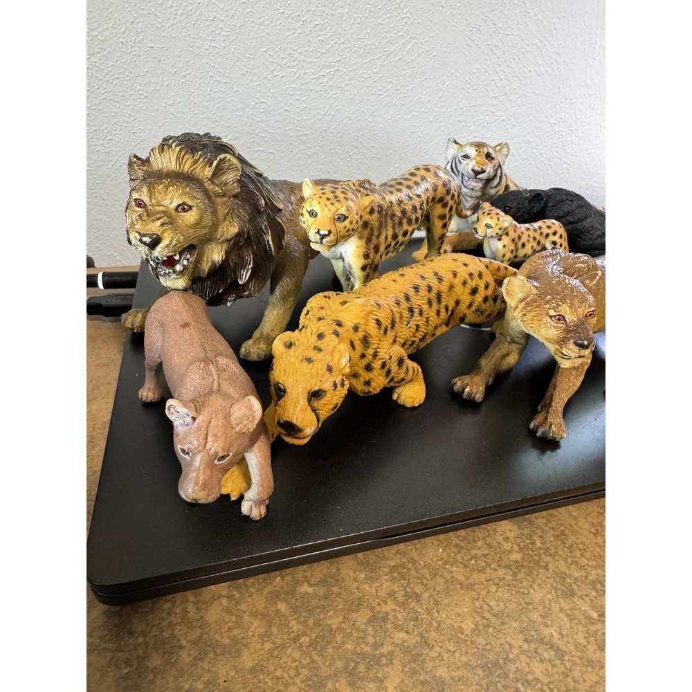 Toy Animals Rubber Lions Tigers And Panther To Heavy to bundle.